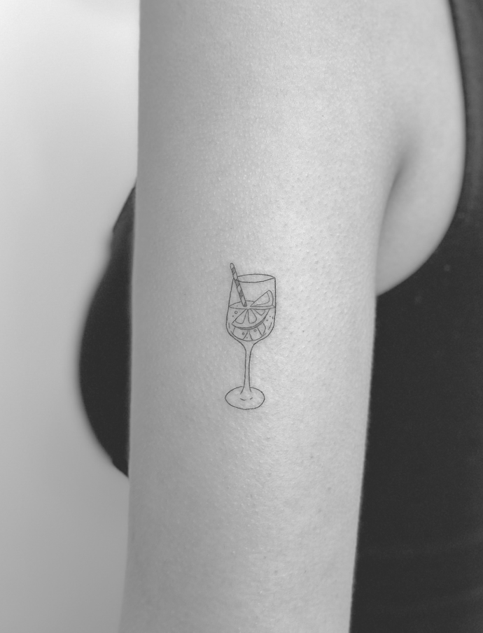 Fine line arm tattoo
